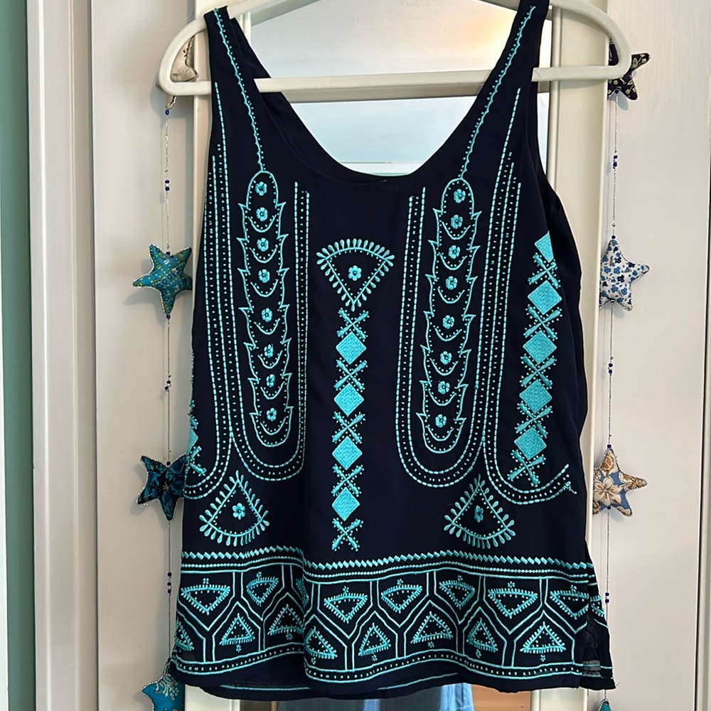 Sundance navy top with turquoise embroidery and beads. M